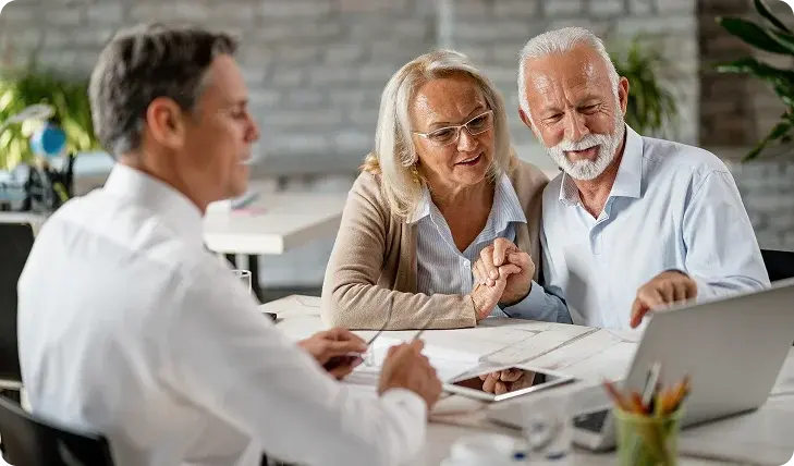 Family reviewing life insurance policy to secure financial future